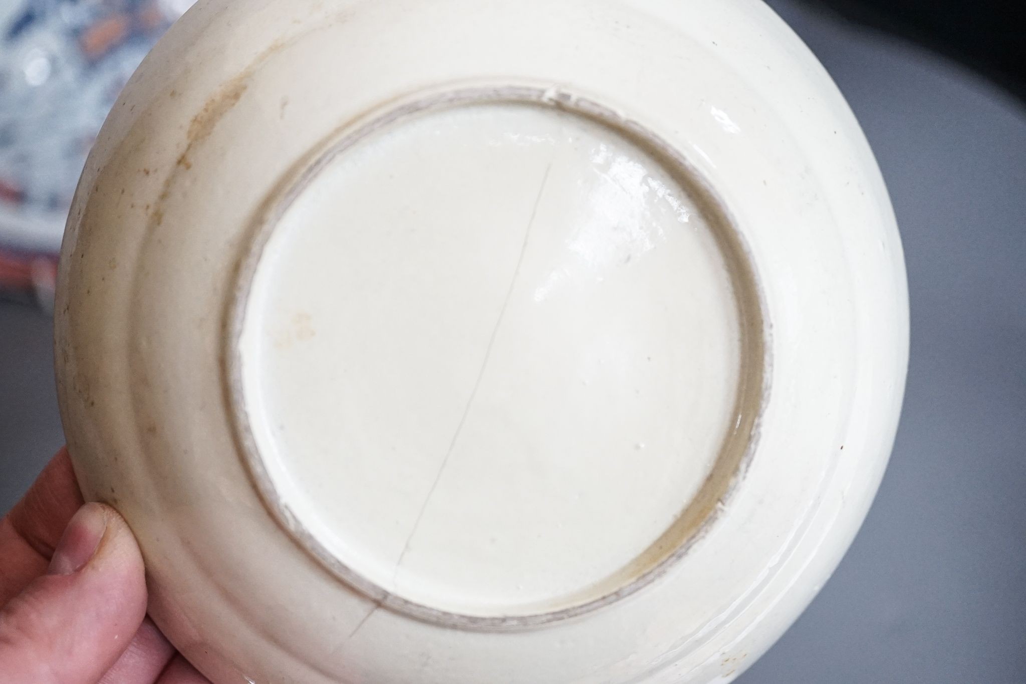 An 18th-century Chinese famille rose small vase, a similar octagonal plate, a 19th-century Cantonese dish and a crackle glaze arrow vase, tallest 15cm
